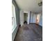 Bright bedroom featuring carpet, a closet, and window at 507 Brookwood St, Mooresville, NC 28115