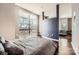 Bright bedroom with city views and stylish decor at 525 E 6Th St # 409, Charlotte, NC 28202