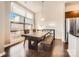 Dining area with large table and bench seating at 525 E 6Th St # 409, Charlotte, NC 28202