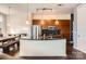 Modern kitchen with stainless steel appliances and a breakfast bar at 525 E 6Th St # 409, Charlotte, NC 28202