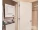 Stackable washer and dryer in a dedicated closet at 525 E 6Th St # 409, Charlotte, NC 28202