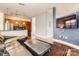 Open concept living area with kitchen and TV at 525 E 6Th St # 409, Charlotte, NC 28202