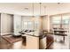 Open living area with access to a balcony and city views at 525 E 6Th St # 409, Charlotte, NC 28202