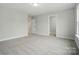 A spacious bedroom with neutral carpeting and ample natural light at 5404 Verona Rd # 36, Charlotte, NC 28213