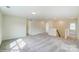 Spacious bonus room featuring neutral walls and carpet, with doors leading to other rooms at 5404 Verona Rd # 36, Charlotte, NC 28213