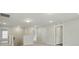 Open hallway on the second floor with neutral paint, carpet, and multiple doorways at 5404 Verona Rd # 36, Charlotte, NC 28213