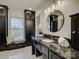 Elegant bathroom with granite countertops, large window, and generous storage at 5529 Five Knolls Dr, Charlotte, NC 28226