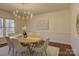 Elegant dining room featuring a chandelier and a view of the outdoors at 5529 Five Knolls Dr, Charlotte, NC 28226