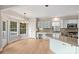 Bright kitchen with granite countertops and light-colored cabinets at 6415 Outer Bridge Ln, Charlotte, NC 28270