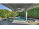 Inviting pool area with pergola cover at 6415 Outer Bridge Ln, Charlotte, NC 28270