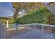 Deck overlooks inviting pool with pergola at 6415 Outer Bridge Ln, Charlotte, NC 28270