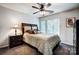 Cozy bedroom with a double bed and ceiling fan at 703 Southwest Dr, Davidson, NC 28036