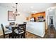 Kitchen features a breakfast bar and a dining area with a round table at 703 Southwest Dr, Davidson, NC 28036