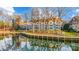 Waterfront community with multiple buildings and a boardwalk at 703 Southwest Dr, Davidson, NC 28036