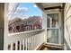 Private entrance with a balcony and white railing at 703 Southwest Dr, Davidson, NC 28036