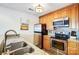 Stainless steel appliances and granite countertops in this kitchen at 703 Southwest Dr, Davidson, NC 28036