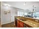 Granite countertops and stainless steel appliances in this kitchen at 703 Southwest Dr, Davidson, NC 28036