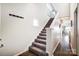 Interior view of a carpeted staircase and hallway at 703 Southwest Dr, Davidson, NC 28036