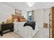 This bedroom features a shiplap wall, stylish decor and carpeted floors at 8022 Franklin Trail St, Mint Hill, NC 28227