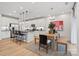 Open kitchen and dining area with stainless appliances and seating at 8022 Franklin Trail St, Mint Hill, NC 28227