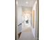 Upstairs hallway with neutral walls and carpet flooring at 8026 Cedarsmith Ct, Charlotte, NC 28217