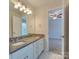 Shared bathroom with granite double vanity at 810 Carisbrooke Ln, Waxhaw, NC 28173