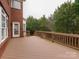 Brown deck with access from house and wooded view at 810 Carisbrooke Ln, Waxhaw, NC 28173