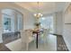 Formal dining room with hardwood floors and chandelier at 810 Carisbrooke Ln, Waxhaw, NC 28173