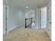 Upstairs hallway with carpet and access to bedrooms at 810 Carisbrooke Ln, Waxhaw, NC 28173