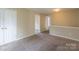 Upstairs bedroom with double doors and closet at 13406 Tartarian Ct, Charlotte, NC 28215