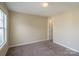 Bedroom with window, closet and door to bathroom at 13406 Tartarian Ct, Charlotte, NC 28215