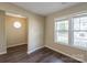 Small dining area with hardwood floors and octagonal window at 13406 Tartarian Ct, Charlotte, NC 28215