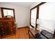 Simple bedroom with hardwood floors and two windows at 1909 2Nd Sw Ave, Hickory, NC 28602