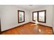 Hardwood floors and classic wooden windows are featured in this bedroom at 1909 2Nd Sw Ave, Hickory, NC 28602