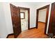 Hallway with hardwood floors and access to bathroom and bedroom at 1909 2Nd Sw Ave, Hickory, NC 28602