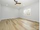 Spacious bedroom with light walls, ceiling fan, and wood-look flooring at 2005 Plain Field Dr, Bessemer City, NC 28016