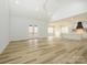 Open and bright great room with high ceilings, hardwood floors, and large windows at 2005 Plain Field Dr, Bessemer City, NC 28016