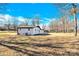 House with a large backyard and mature trees at 2108 Sherwood Forest Ln, Monroe, NC 28110