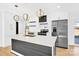 Modern kitchen with white and dark wood cabinets at 2108 Sherwood Forest Ln, Monroe, NC 28110