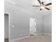 Spacious bedroom with window and ceiling fan at 2754 Crowders Creek Rd, Gastonia, NC 28052