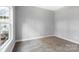 Bright bedroom with window and carpeted floors at 2754 Crowders Creek Rd, Gastonia, NC 28052