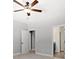 Spacious bedroom with ceiling fan and access to bathroom at 2754 Crowders Creek Rd, Gastonia, NC 28052