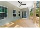 Wooden deck with ceiling fan and sliding glass door at 2754 Crowders Creek Rd, Gastonia, NC 28052