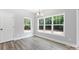 Bright dining room with large windows and wood flooring at 2754 Crowders Creek Rd, Gastonia, NC 28052