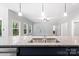 Kitchen island with granite countertop and double sink at 2754 Crowders Creek Rd, Gastonia, NC 28052