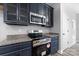 Stainless steel range and microwave in a modern kitchen at 2754 Crowders Creek Rd, Gastonia, NC 28052