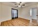 Well-lit bedroom featuring laminate floors and a ceiling fan at 37 Hamiltons Harbor Dr # 601, Lake Wylie, SC 29710