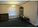 Bright dining room with a window and modern ceiling fan at 3958 Benny Shrum Ln, Maiden, NC 28650