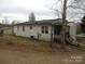 This home has a ramp that leads to the front porch. There is also siding and trim at 3958 Benny Shrum Ln, Maiden, NC 28650