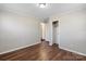 This is a spacious bedroom with wood floors, neutral walls, and closet, offering ample space at 503 N Boyce St, Gastonia, NC 28052